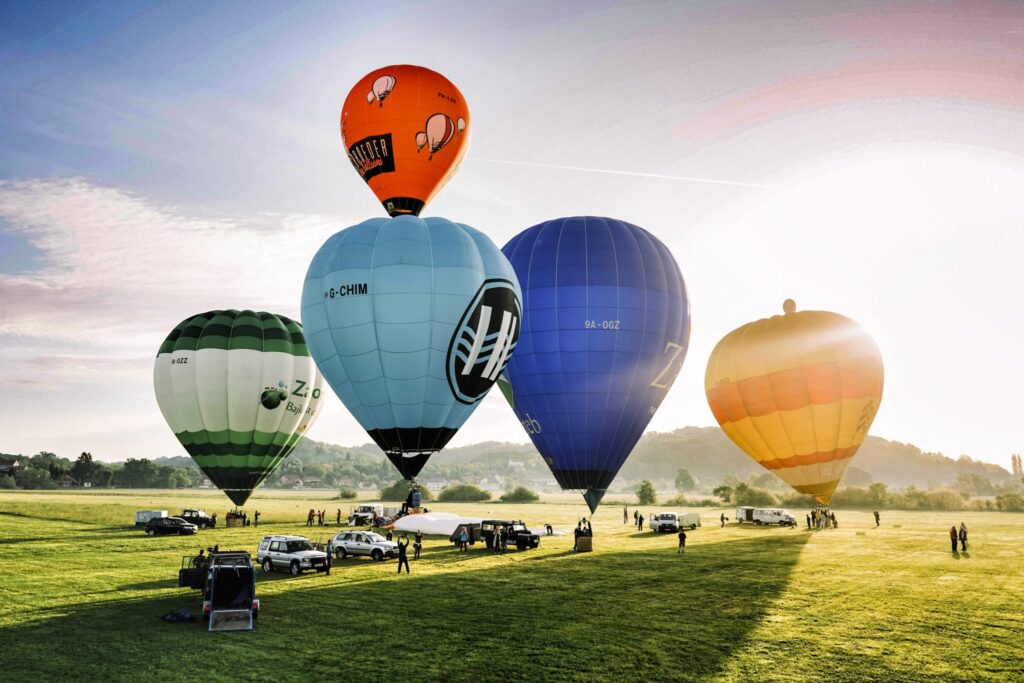Hot air balloons over Zagreb's skyline, showcasing the city's historic landmarks.